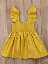 Load image into Gallery viewer, Baby apron style dress has a ruffled adjustable straps and a stretchy bodice with a big bow