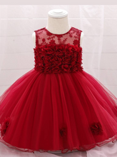 Load image into Gallery viewer, The dress has a bodice with flower applique and tulle skirt