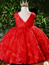 Load image into Gallery viewer, Baby tulle dress' bodice has a delicate flower applique in tulle, has a multicolor layered skirt and bow at the back