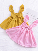 Load image into Gallery viewer, Baby apron style dress has a ruffled adjustable straps and a stretchy bodice with a big bow