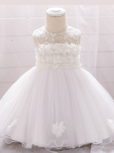 Load image into Gallery viewer, The dress has a bodice with flower applique and tulle skirt