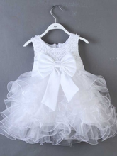 Load image into Gallery viewer, Baby princess dress has a satin bodice with pearl details, a bow belt at the waist, and a layered tulle skirt -white