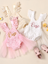 Load image into Gallery viewer, Baby lace overall onesie that ties at the back with tulle train, little ruffles at the shoulder, and a gold "One" printed on the bodice