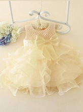 Load image into Gallery viewer, Baby tulle dress bodice has a delicate pearl detail with a bow at the waistline and a multilayer tulle skirt