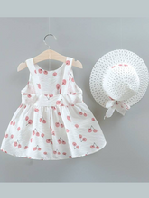 Load image into Gallery viewer, baby summer dress has an adorable cherry print and a large bow at the front and comes with a matching hat