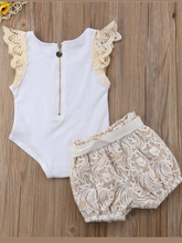 Load image into Gallery viewer, Baby set features a short-sleeved onesie with a crochet ruffle at the shoulder and embroidered shorts with a sash