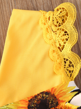 Load image into Gallery viewer, Baby yellow romper onesie with a skirt overlay with sunflower print and matching headband