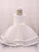 Load image into Gallery viewer, Baby dress features beautiful beads on the bodice, voile with satin hem-white