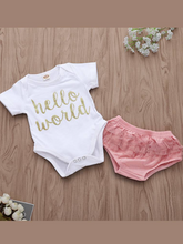 Load image into Gallery viewer, Baby set features a short-sleeved onesie with "Hello World" print and ruffled bloomers