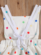 Load image into Gallery viewer, Baby white dress has a colorful polka dot print and rainbow applique pullover style ties at the back
