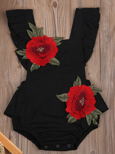 Load image into Gallery viewer, Baby little onesie has big red flower appliques and ties at the back for easy slip-on black
