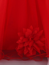 Load image into Gallery viewer, Baby dress has a tulle overlay with flower applique and a satin belt with rhinestone detail-red
