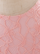 Load image into Gallery viewer, Baby dress has embroidered tulle overlay bodice and hi-lo tulle overlay skirt, removable big bow accent at the back and flower applique at the front
