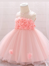Load image into Gallery viewer, The dress has a bodice with flower applique and tulle skirt
