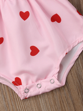 Load image into Gallery viewer, Baby onesie with ruffled short sleeves and a cute collar. Front button and elastic waist. pink with red heart  snap at the bottom 
