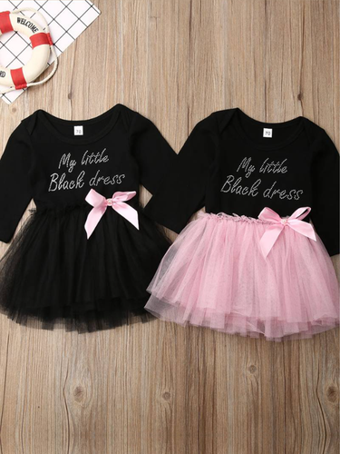 tutu dress has a long sleeved black bodice with 