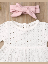 Load image into Gallery viewer, Baby set features an eyelet hi-lo tunic and belted leggings
