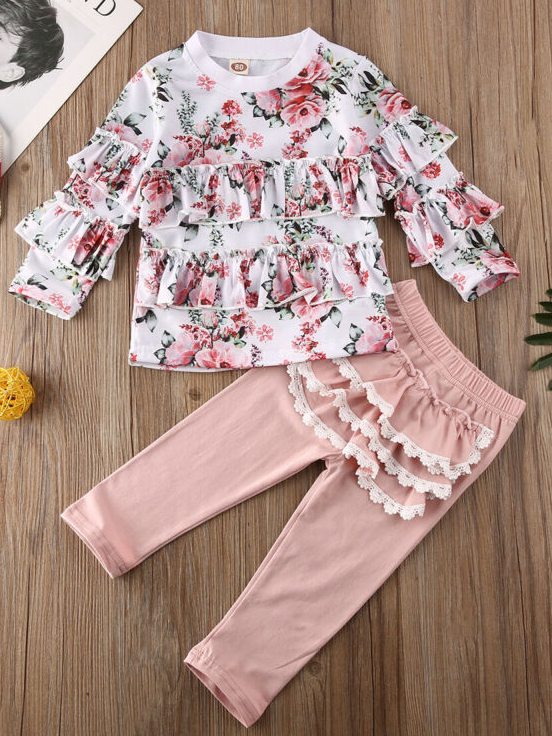 Baby set features a long-sleeved ruffled top and ruffled leggings