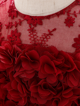 Load image into Gallery viewer, The dress has a bodice with flower applique and tulle skirt
