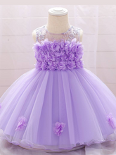 Load image into Gallery viewer, The dress has a bodice with flower applique and tulle skirt
